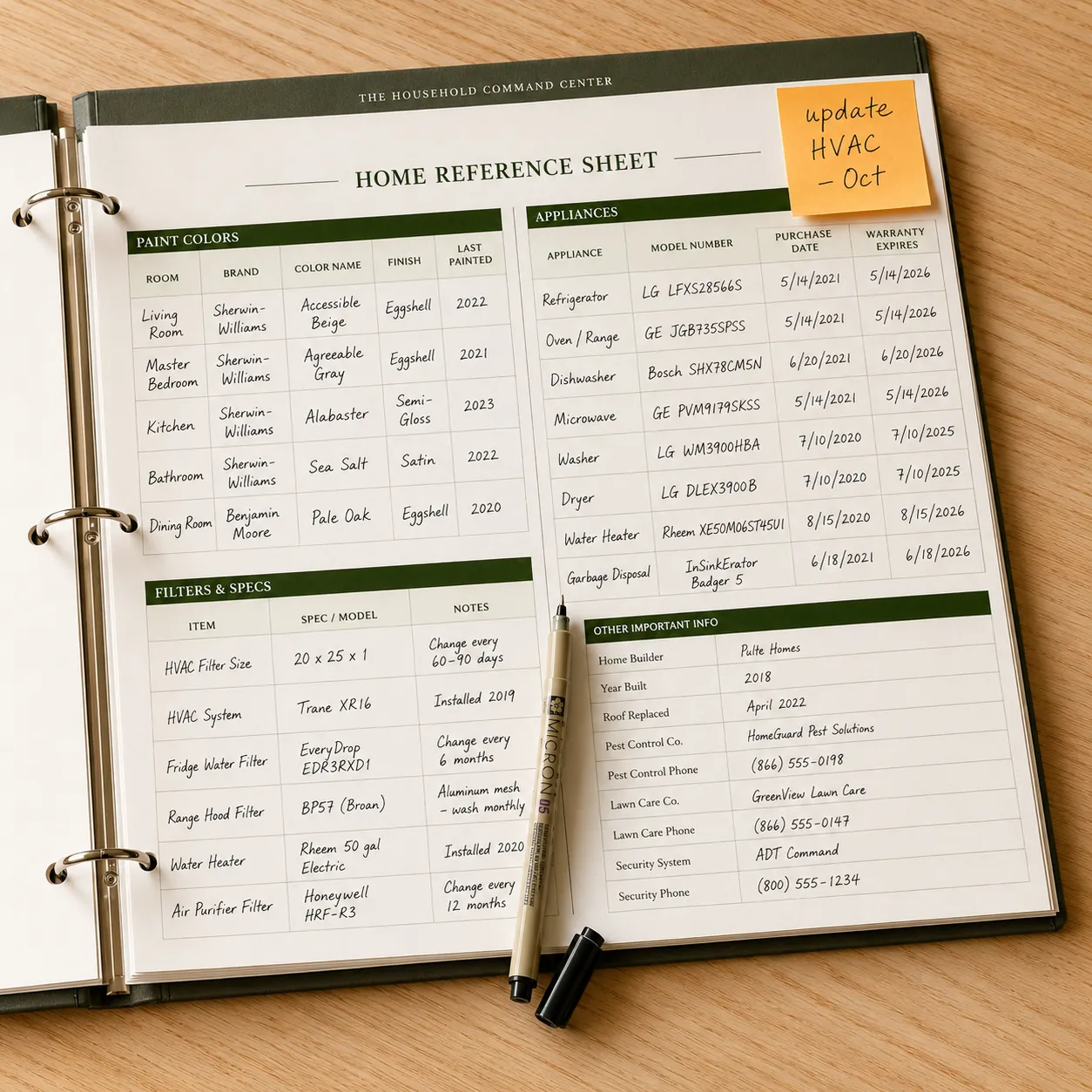 The Household Command Center binder open to home reference sheet with paint colors, appliances, and filter specs